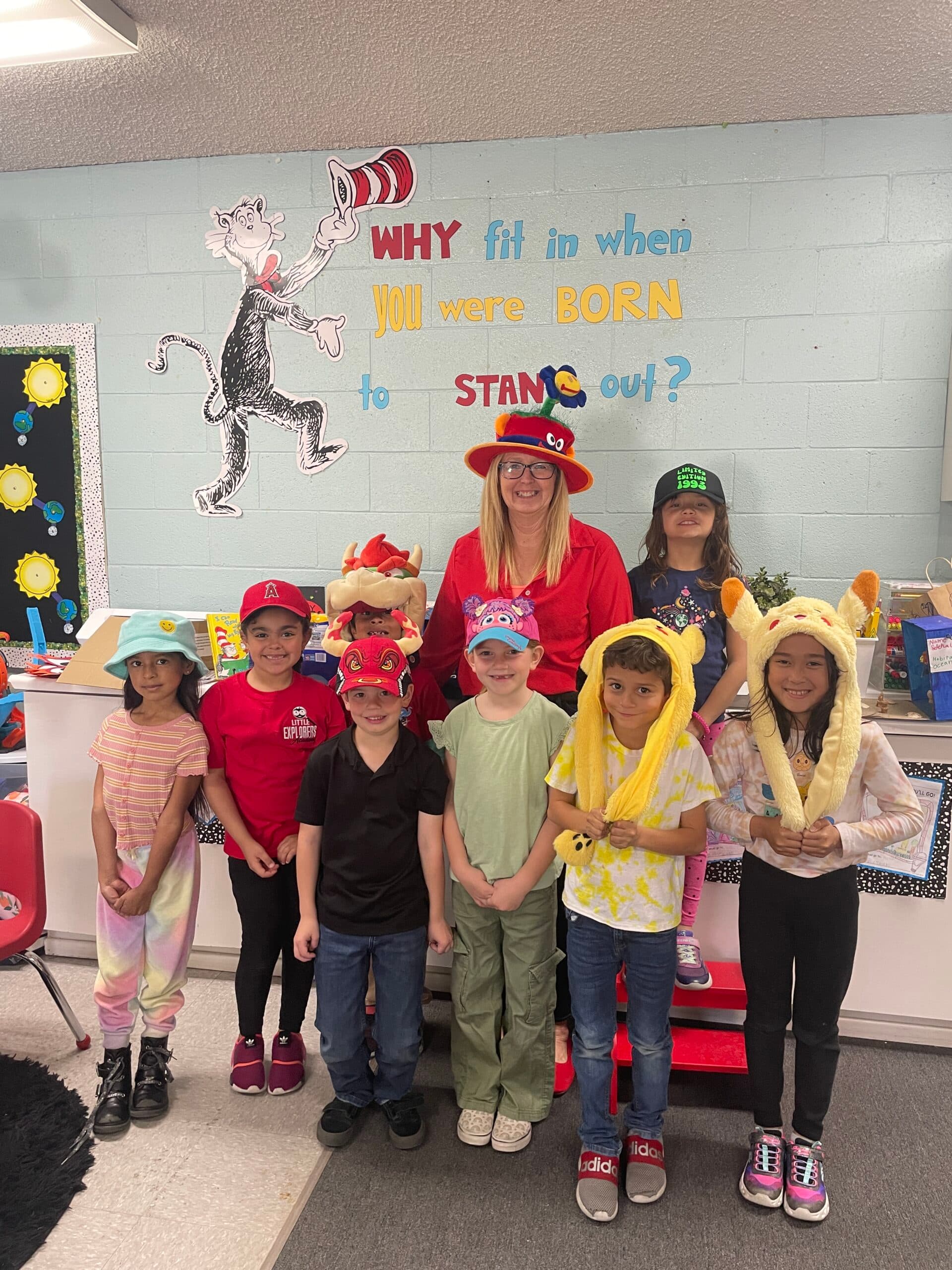Teacher and students dressed up for a Dr. Seuss classroom celebration